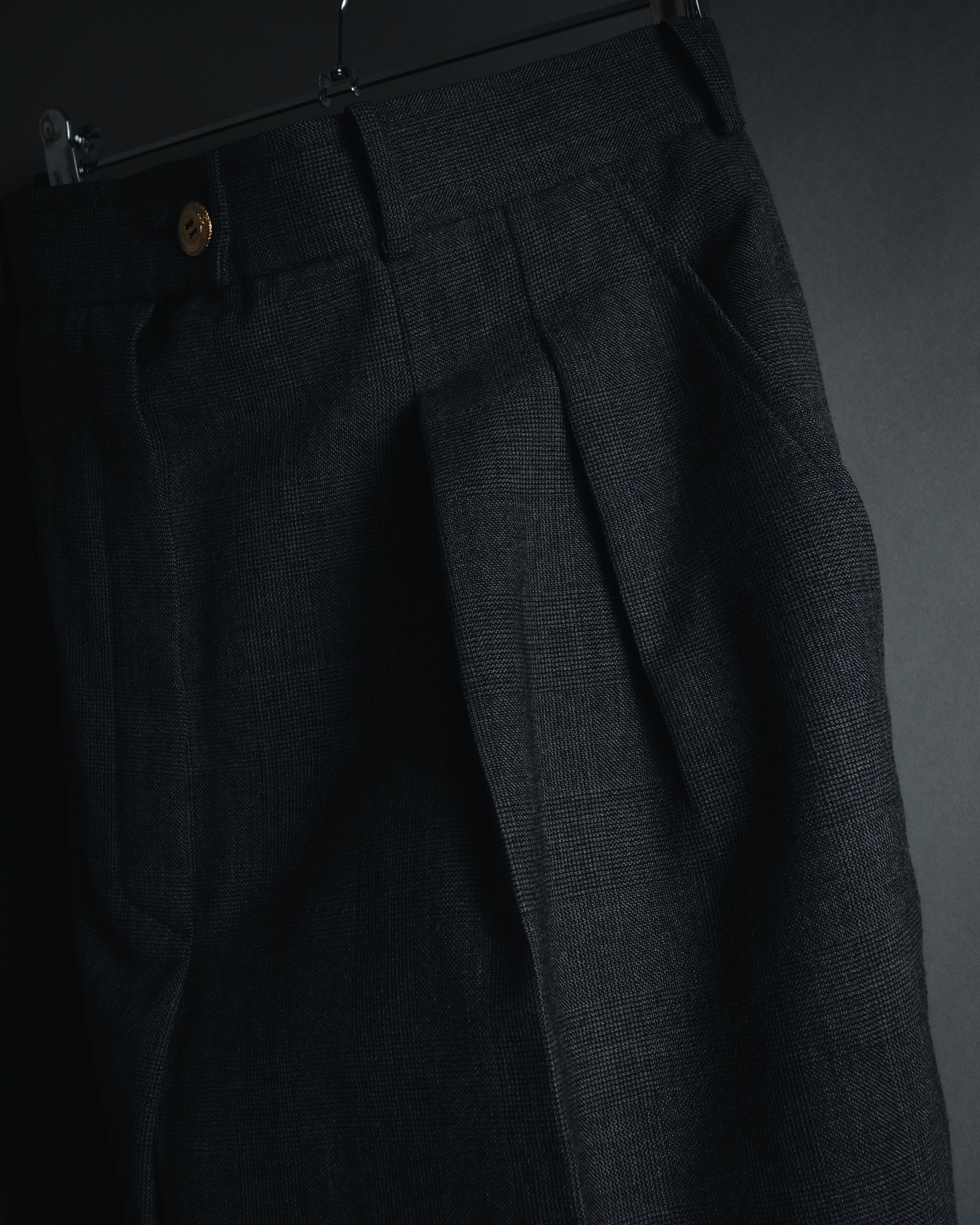 "CHANEL" high-waisted pleated trousers with signature gold button