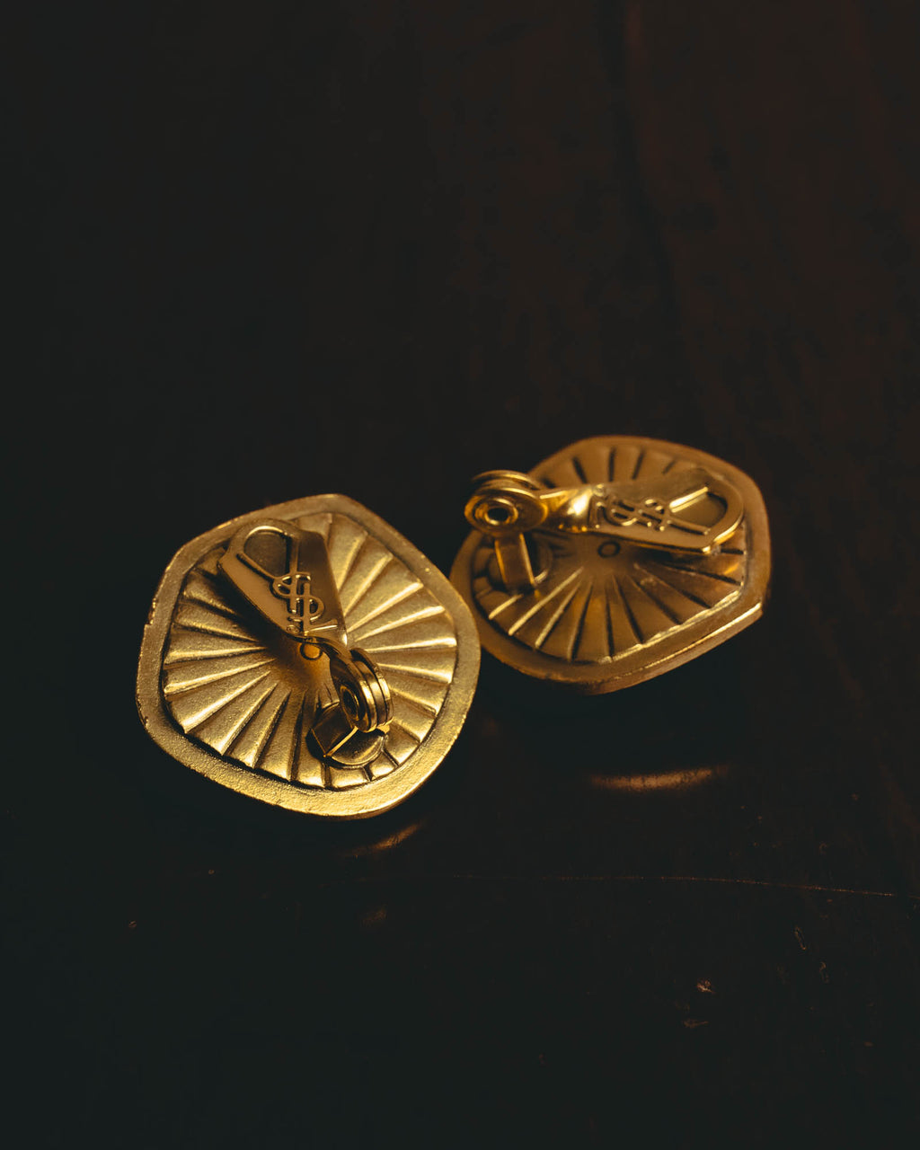 "Yves Saint Laurent" 80's-90's Sculptural black cabochon clip-on earrings