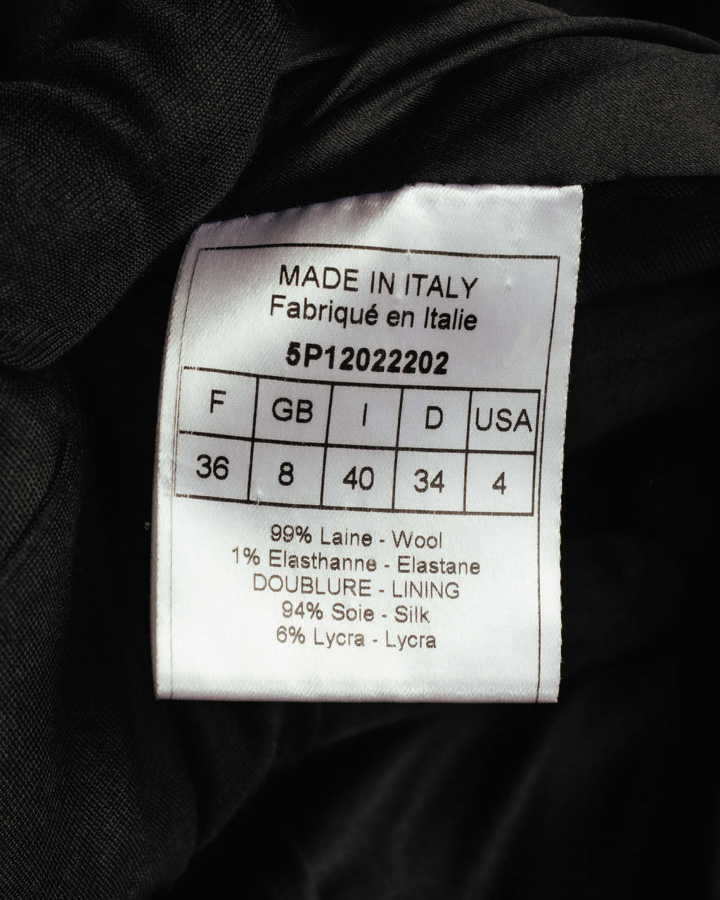 イタリア製表記と品番5P12022202、フランス36を含む各国サイズ表記を確認できる品質表示タグ。表地はウール99％・ポリウレタン1％、裏地はシルク94％・ポリウレタン6％と記載されています。