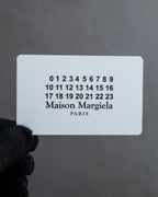 "MAISON MARGIELA" Grained leather chain wallet bag