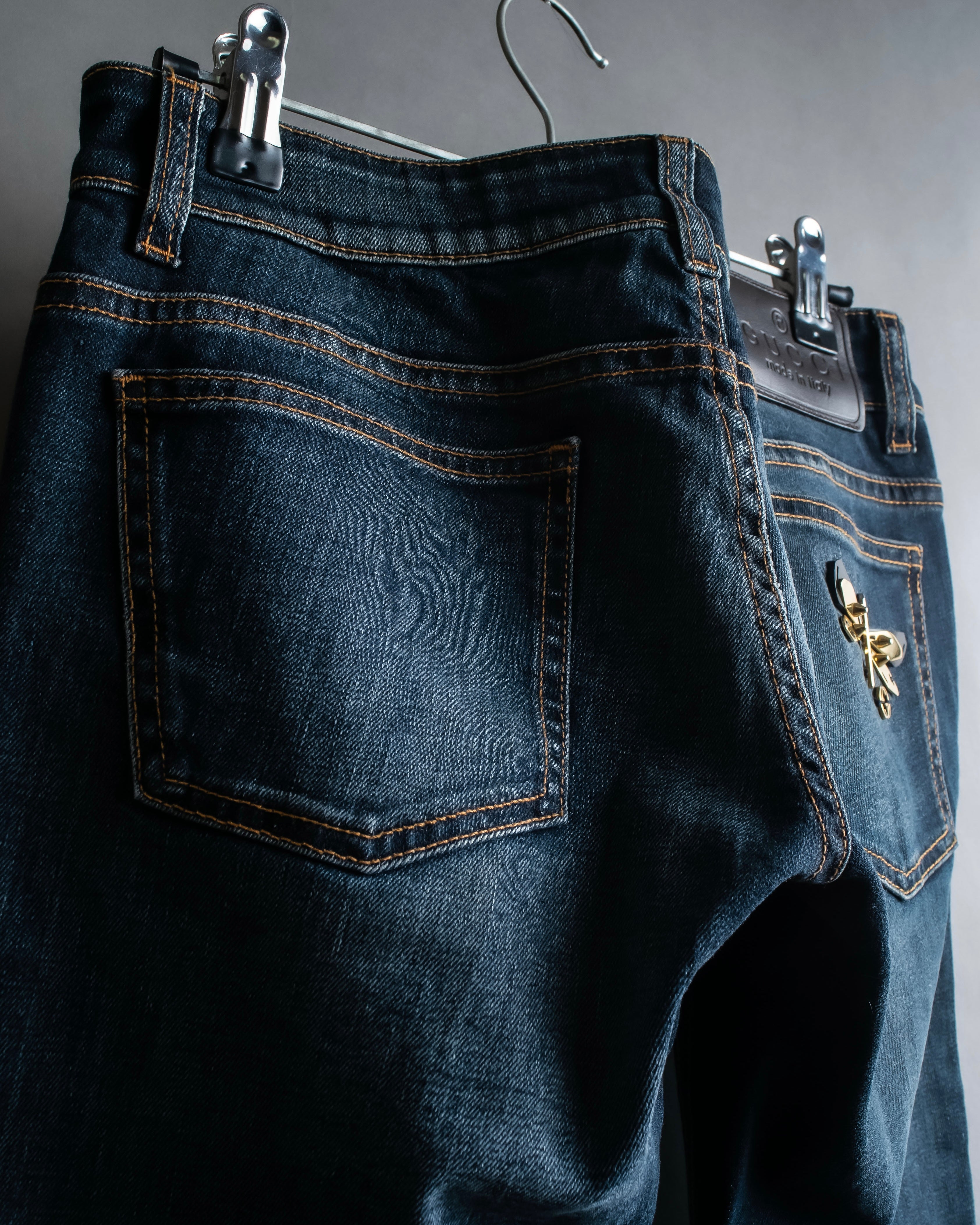 Pantalones de mezclilla con lavado de libélula de GUCCI