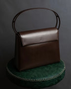 "GIVENCHY MAROQUINERIE" Trapezoidal brown leather one-handle bag