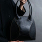 "LOEWE" Textured leather one handle bag