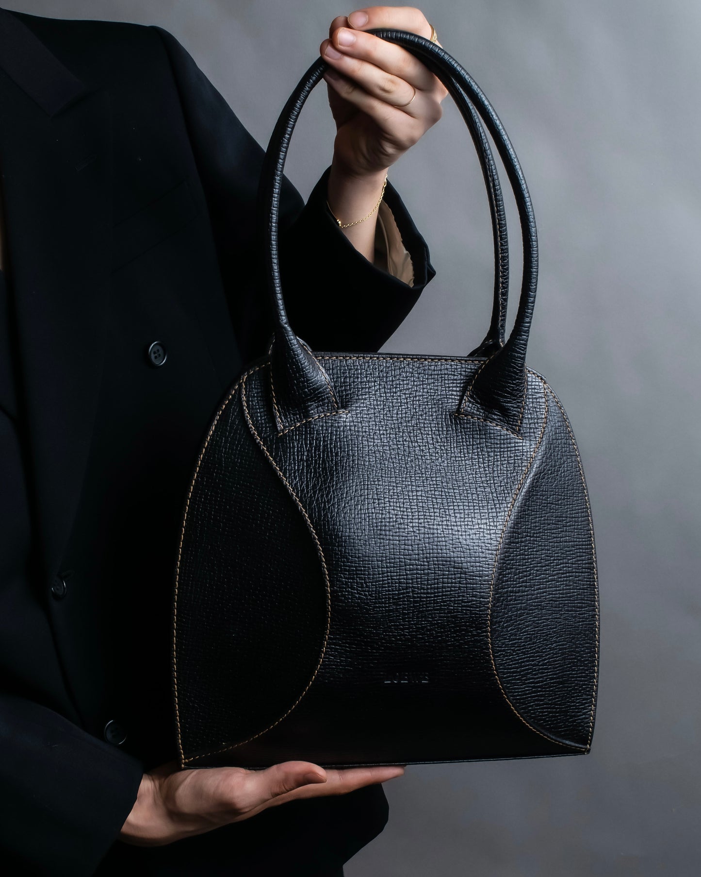 "LOEWE" Textured leather one handle bag