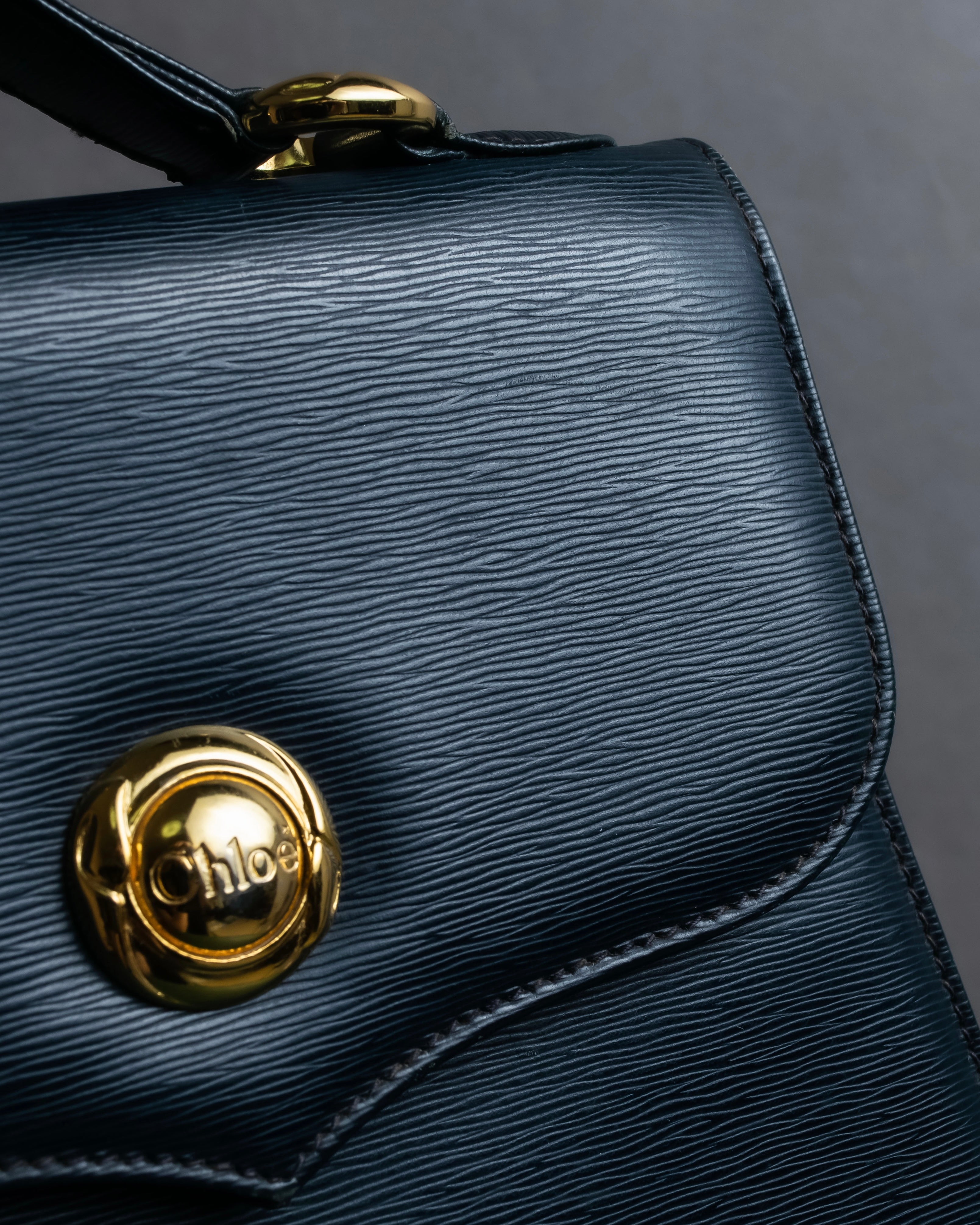 "Chloe" Trapezoid design embossed leather hand bag