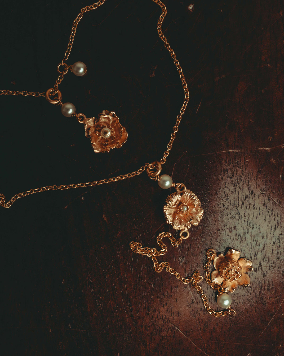 “Christian Dior” 2019-2025 Gold floral charm necklace with pearl accents