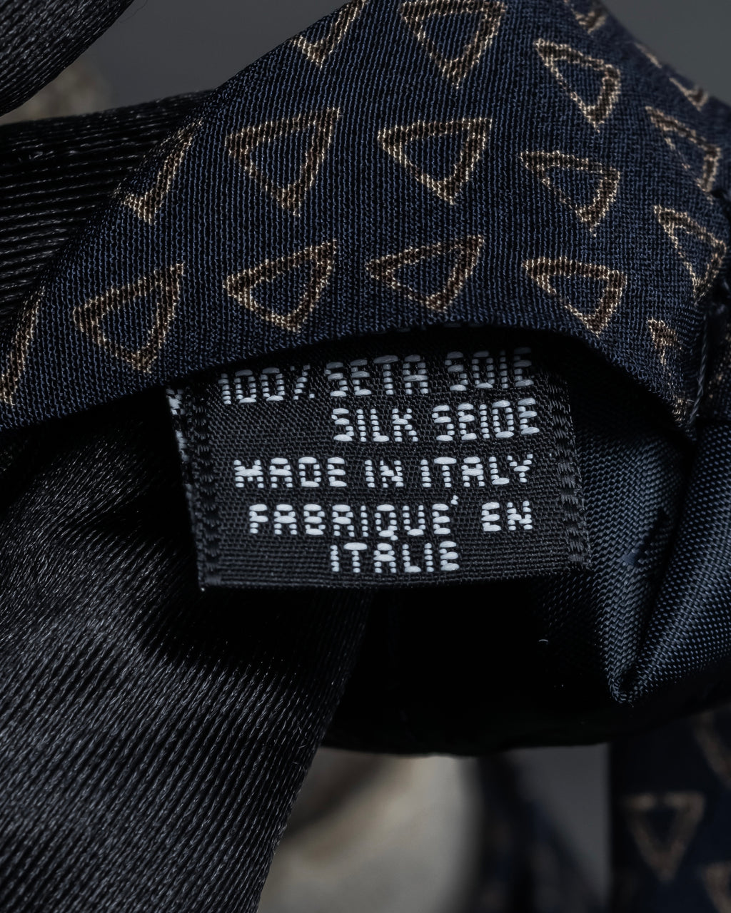 "ARMANI COLLEZIONI" Repeated triangle motif silk neck tie