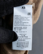 "MAISON MARGIELA" Beige color turtleneck sleeveless wool knit