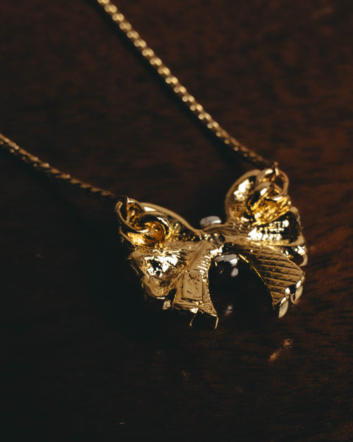 "Yves Saint Laurent" 80's-00's Sculptural ribbon pendant necklace