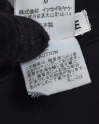 "ISSEY MIYAKE" Organic cutout fringe wrap skirt