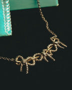 "Tiffany & Co." 80's-90's Sculptural triple bow necklace