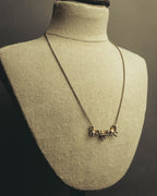 "Tiffany & Co." 80's-90's Sculptural triple bow necklace