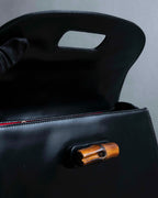 "GUCCI" Black leather bamboo handbag
