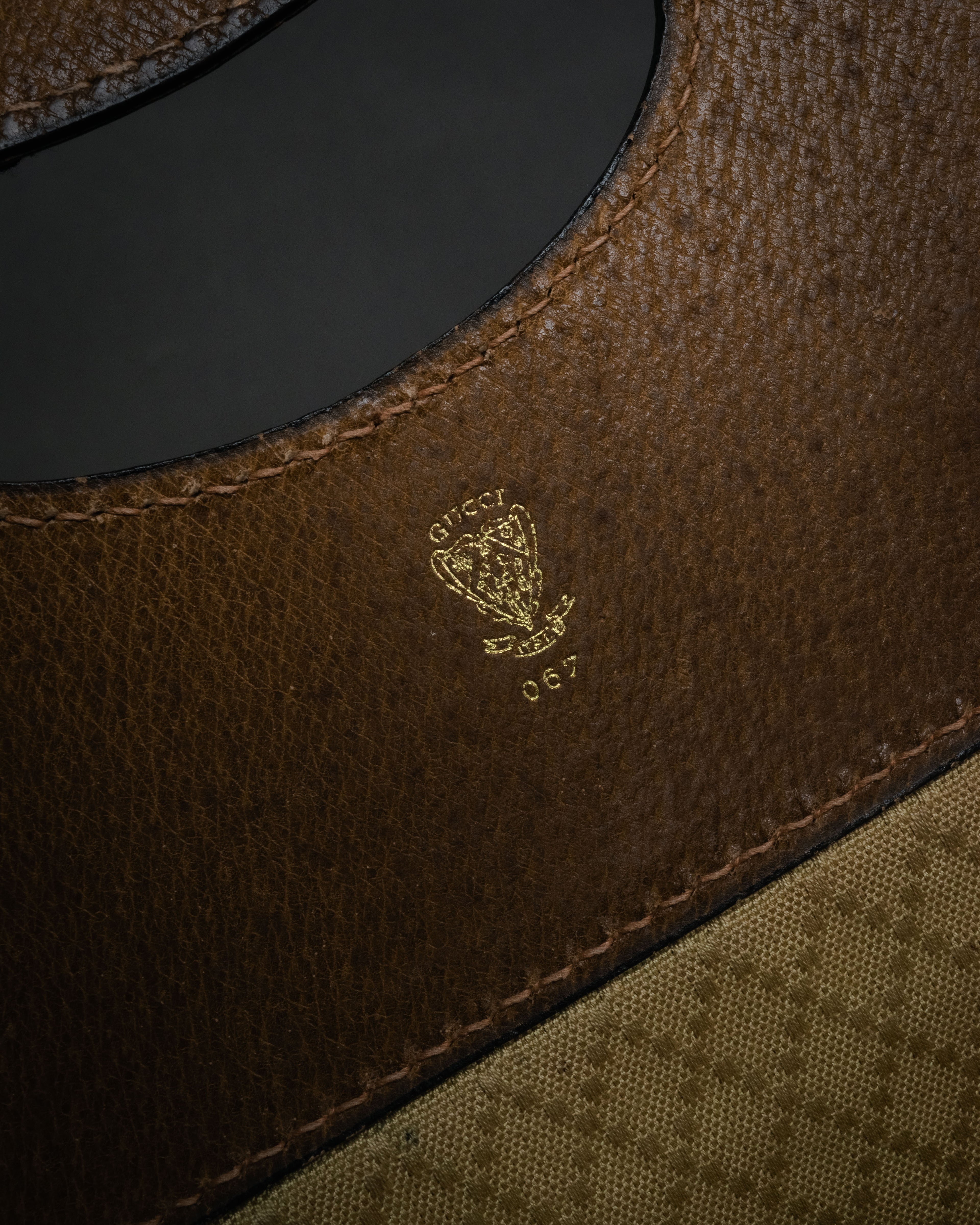 “GUCCI” Late 70’s-early 80’s suede and leather cutout handle bag