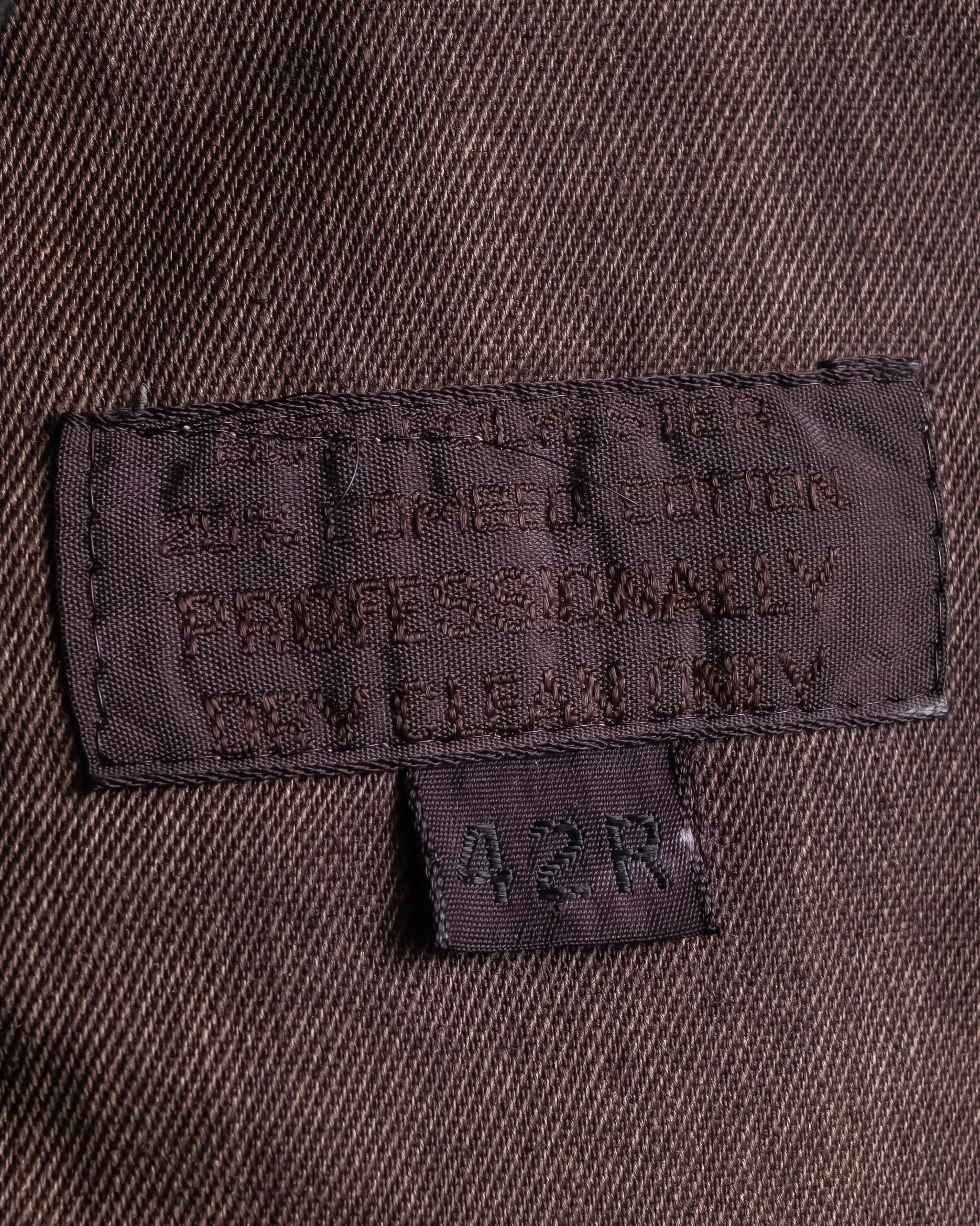 "CHRISTIAN DIOR MONSIEUR"
 Dark brown oversized trench coat