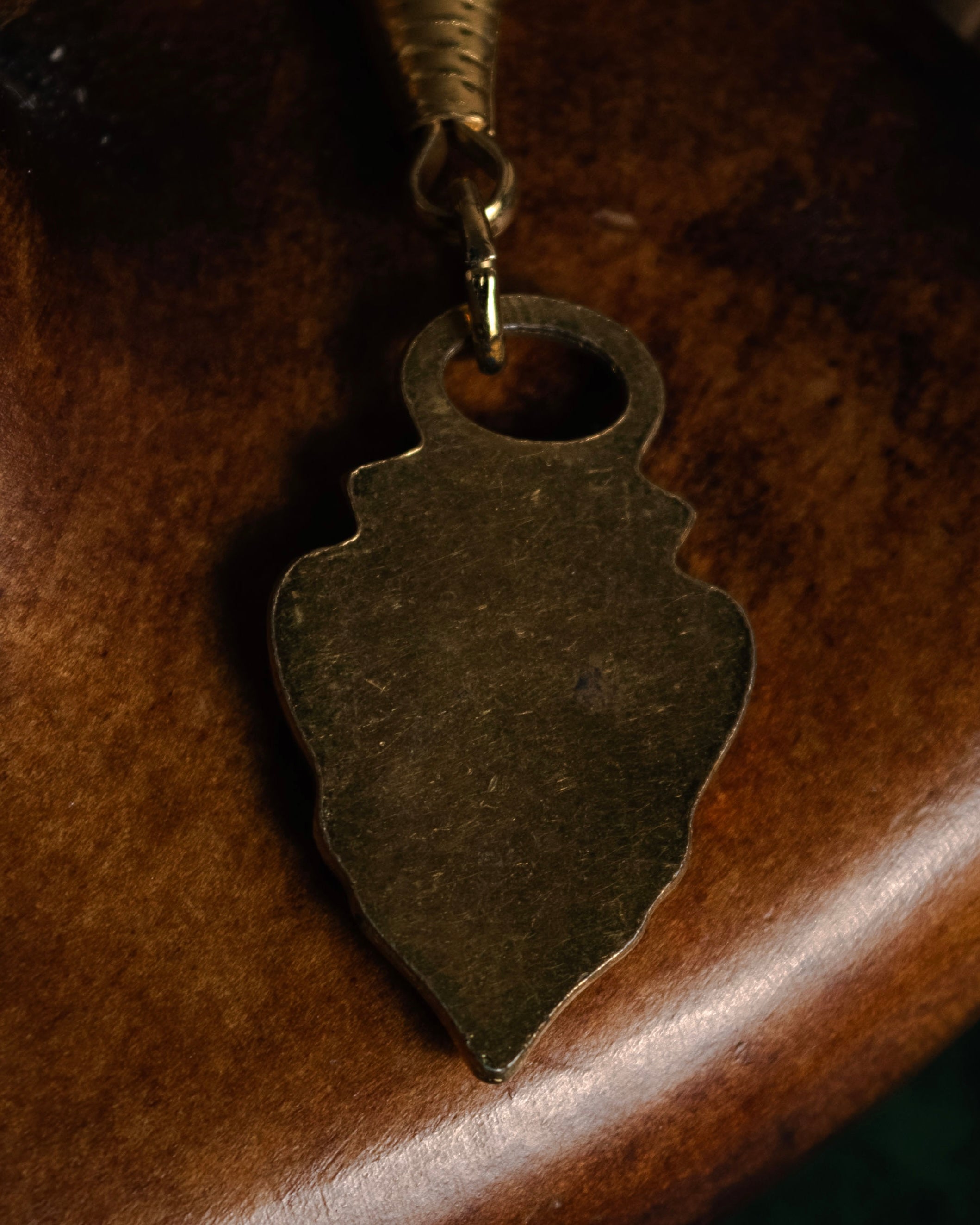 “GUCCI” 70’s-80’s Crest shield charm with spring clasp