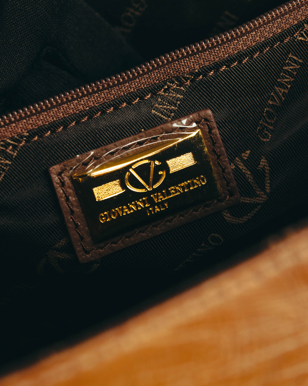 “GIOVANNI VALENTINO” Structured ostrich top handle bag