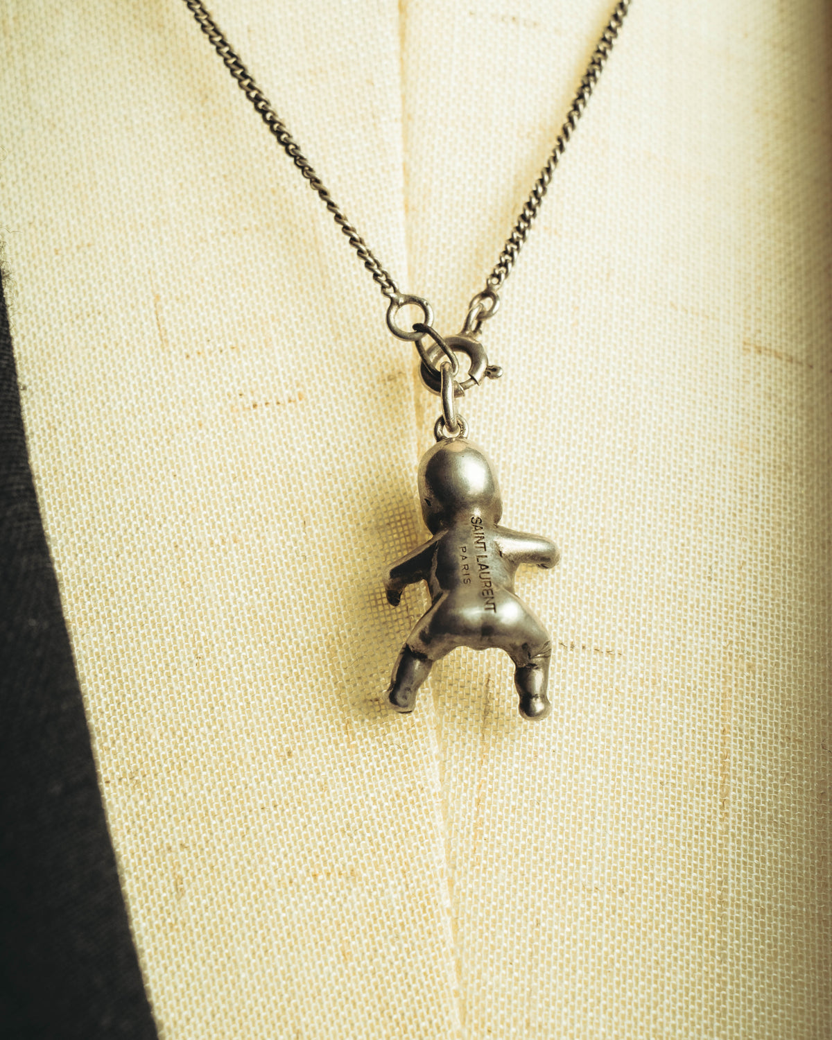 "Saint Laurent" 10's-20's Sculptural doll pendant necklace