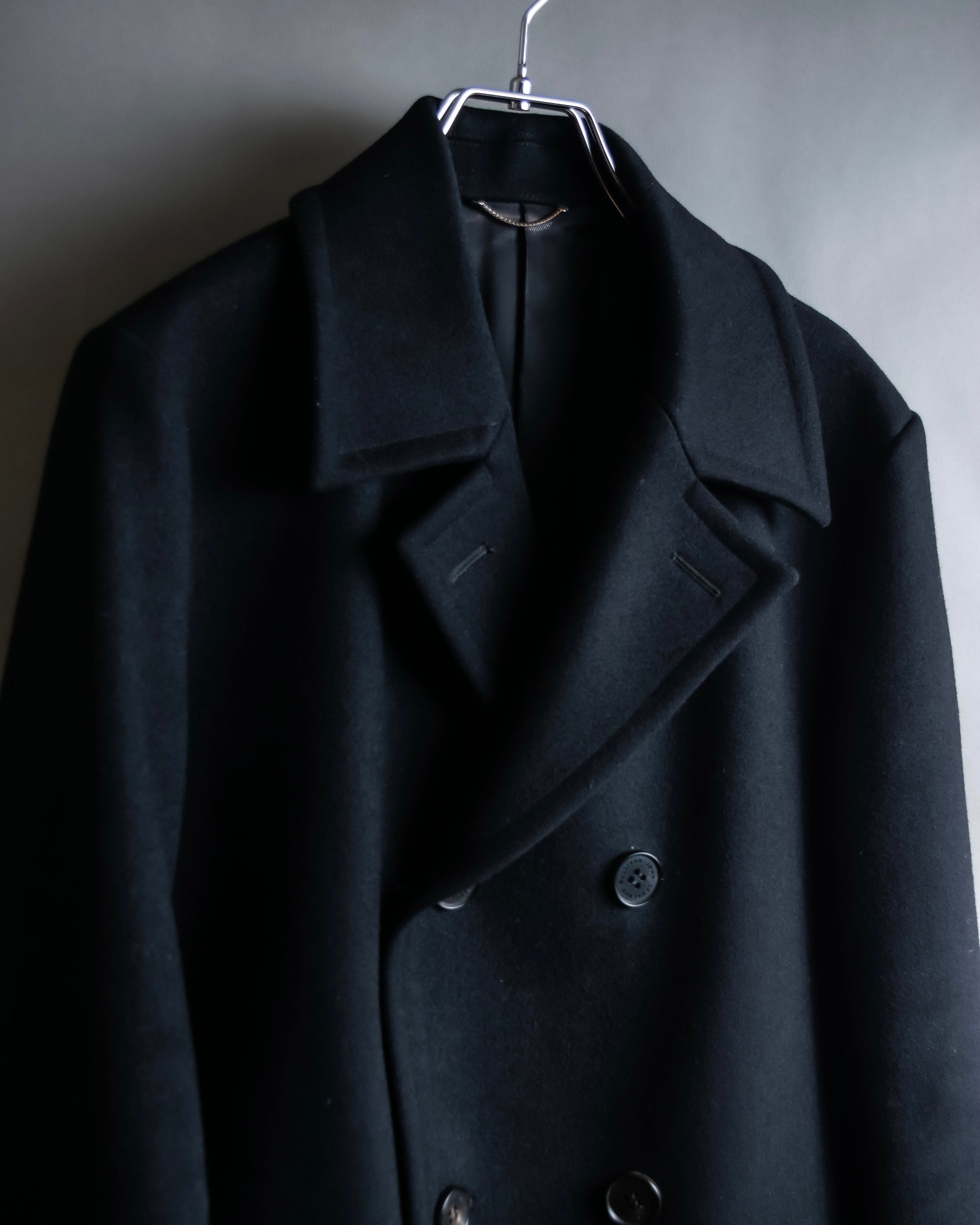 "JOHN LAWRENCE SULLIVAN"
 Large lapel double-breasted mid length coat