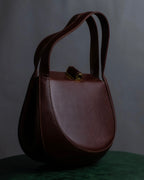 "Salvatore Ferragamo" Half-moon shaped Bordeaux color leather shoulder bag