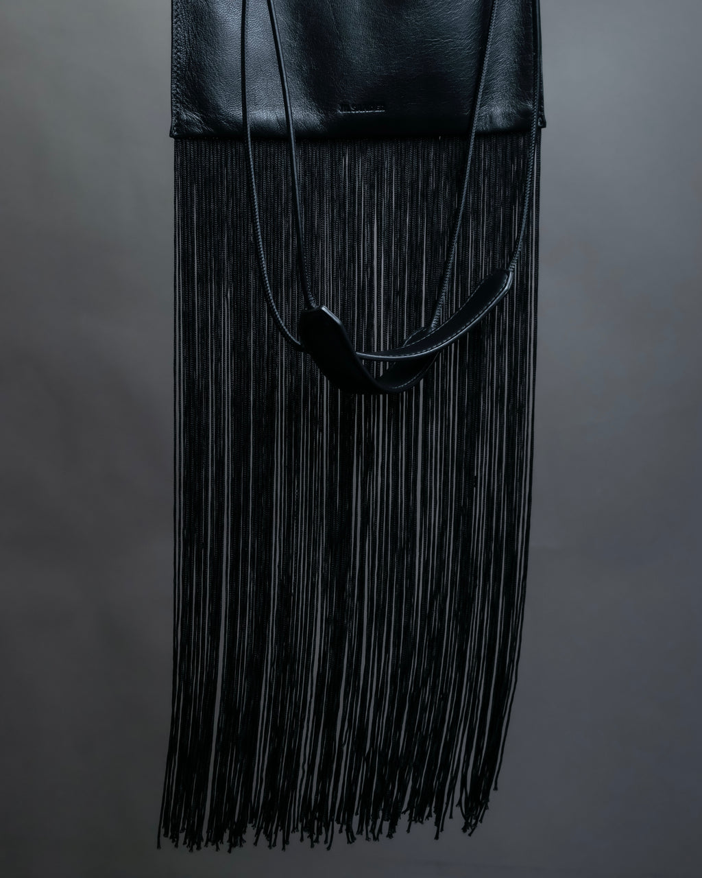 “JIL SANDER” Fringe detail flat drawstring shoulder bag