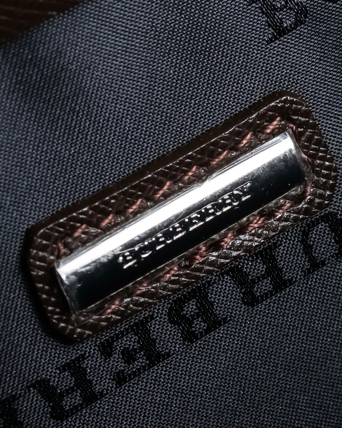 "BURBERRY" Metal belt design embossed PVC briefcase