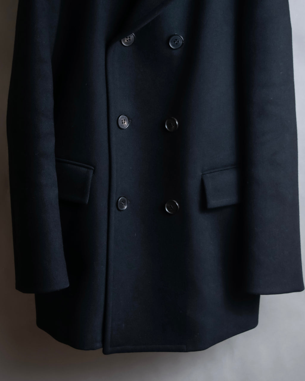 "JOHN LAWRENCE SULLIVAN"
 Large lapel double-breasted mid length coat