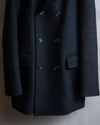"JOHN LAWRENCE SULLIVAN"
 Large lapel double-breasted mid length coat