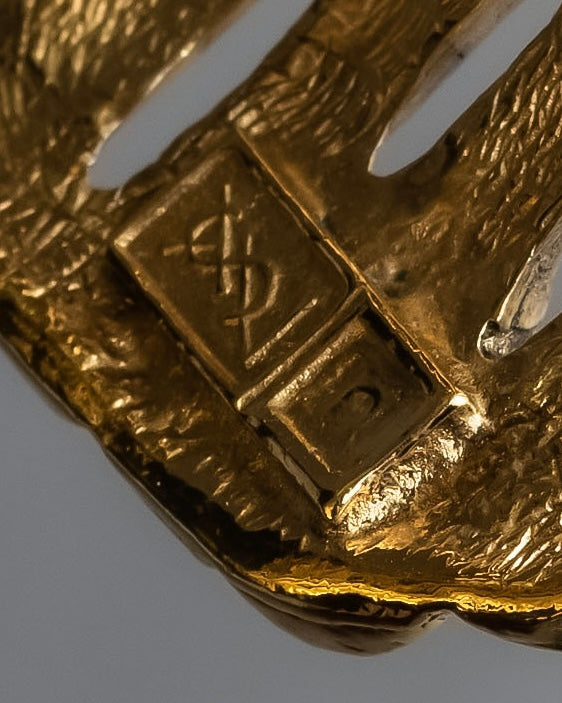 "YVES SAINT LAURENT" Skeletal arm shape design gold bangle