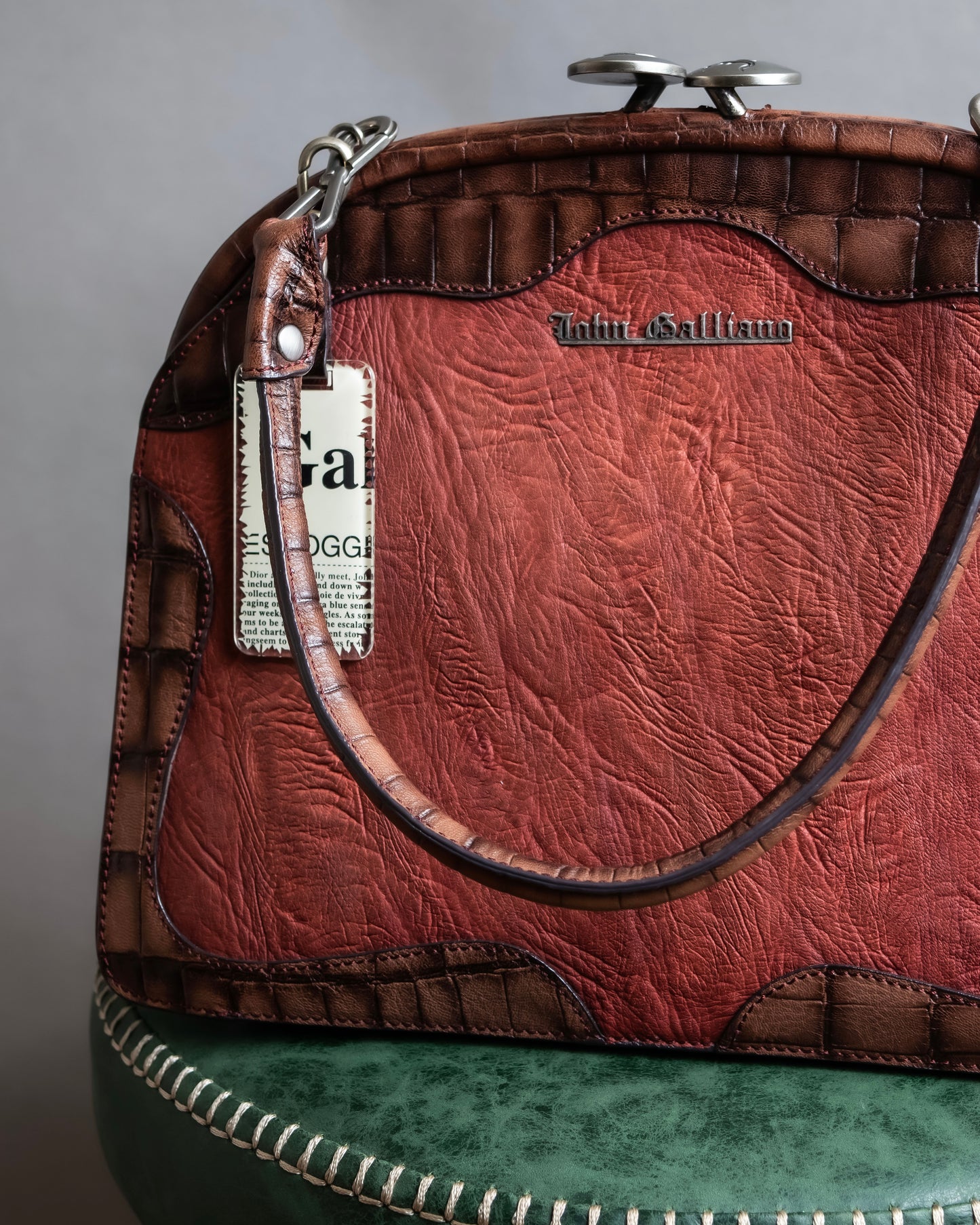 "John Galliano" Trapezoid design clasp different leather hand bag