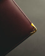 “Cartier” 90’s Must de Cartier burgundy embossed leather bifold wallet