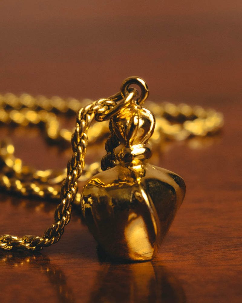 "Christian Dior" 80's-90's Gold tone bottle pendant necklace
