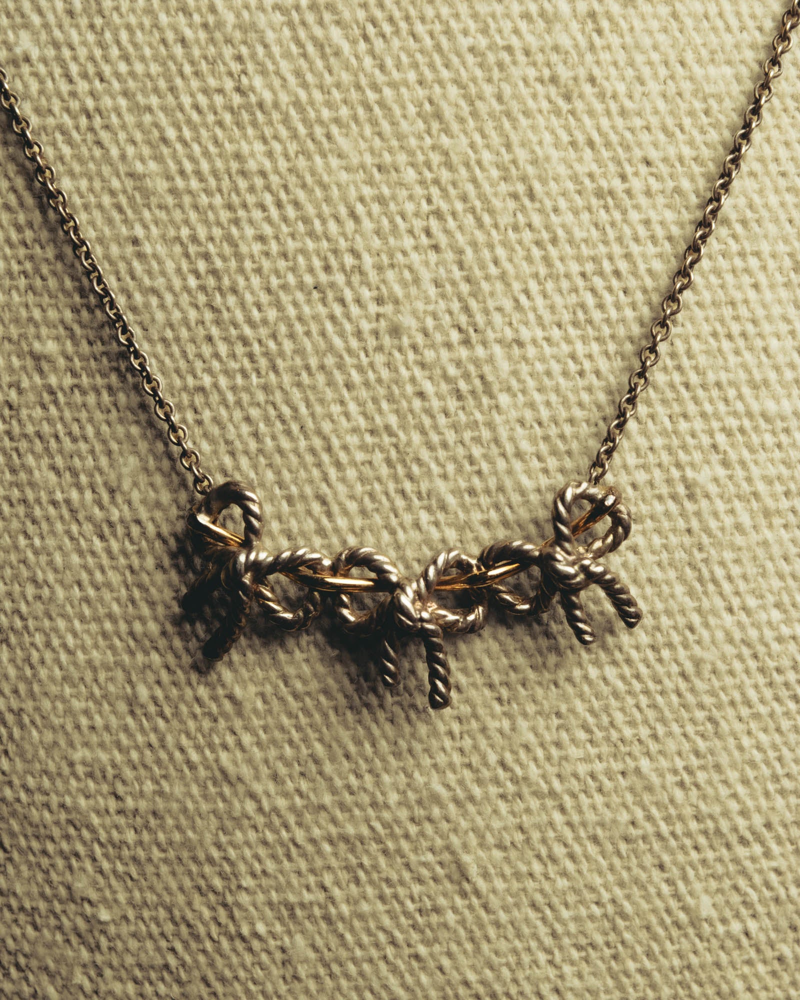 "Tiffany & Co." 80's-90's Sculptural triple bow necklace