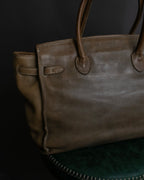 "Mademoiselle Accessories"
 Silver parts design leather one handle bag