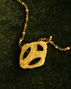 "Yves Saint Laurent" 80's-90's Gold tone rhinestone pendant necklace
