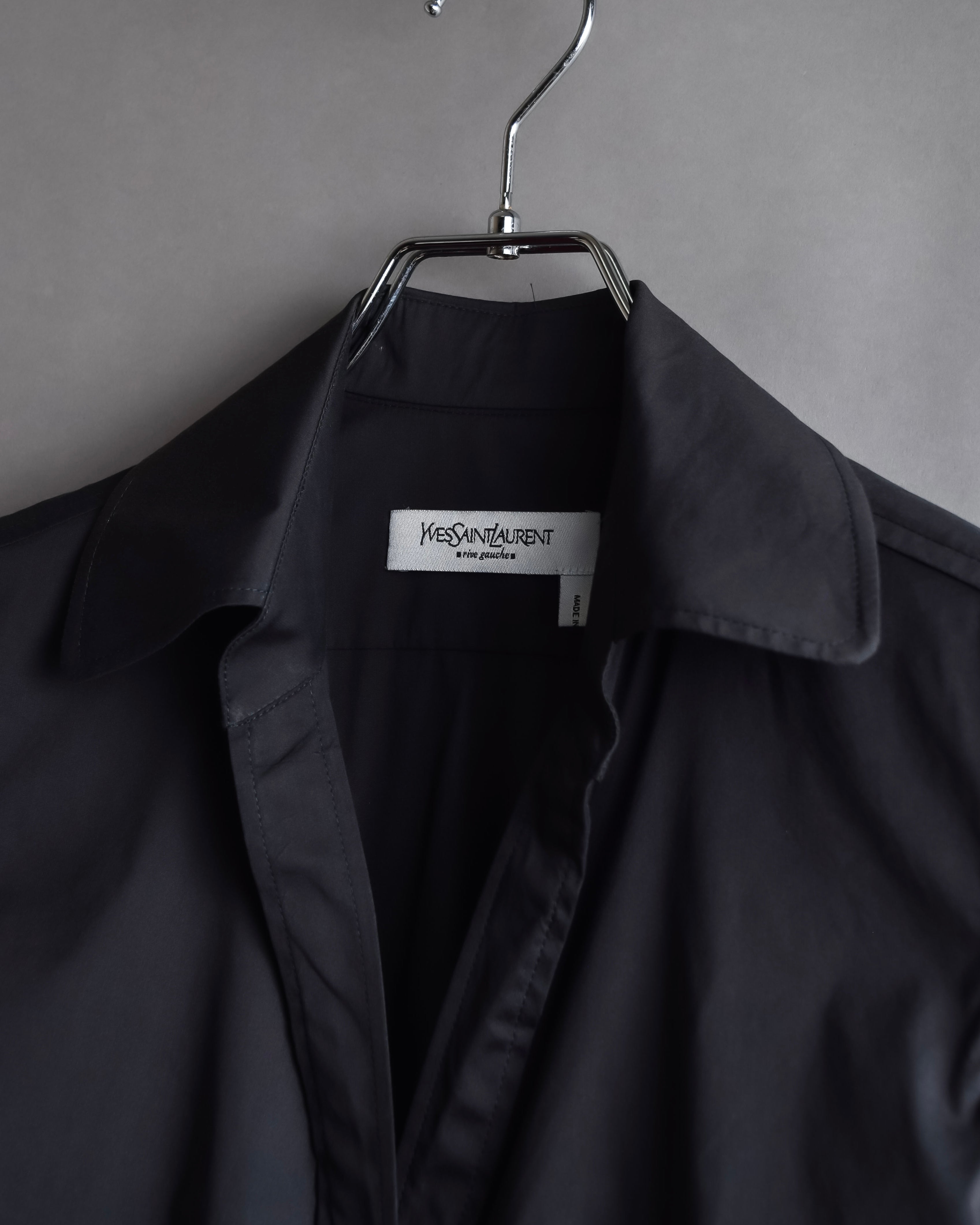 "Yves Saint Laurent Rive Gauche"
Twisted front sleeveless shirt