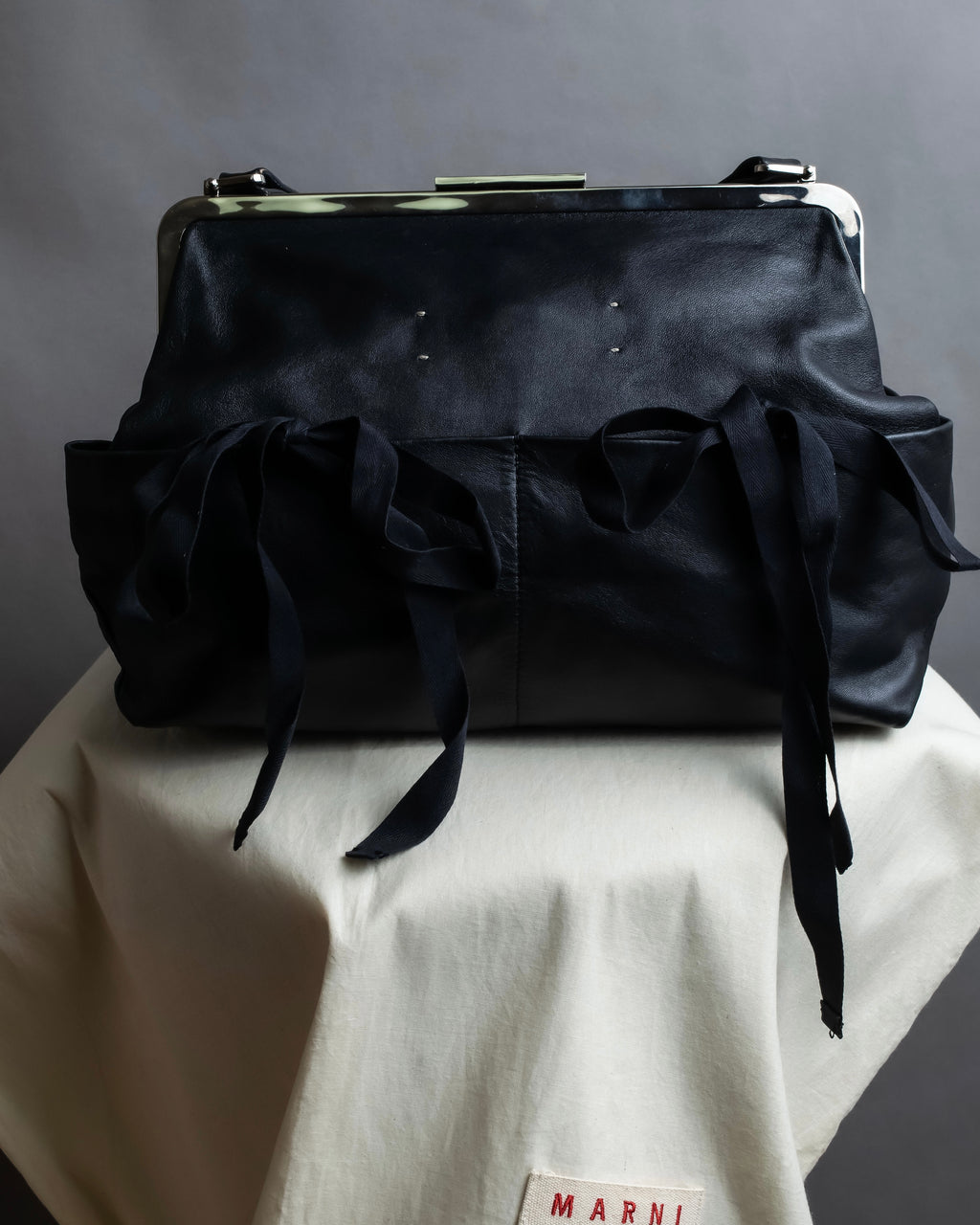 "MARNI" Side ribbon design rounded body leather bag
