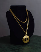 "YVES SAINT LAURENT" Embossed medallion YSL charm necklace