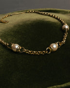 "YVES SAINT LAURENT" 80's-90's Gold-tone rolo chain necklace with faux pearl accents