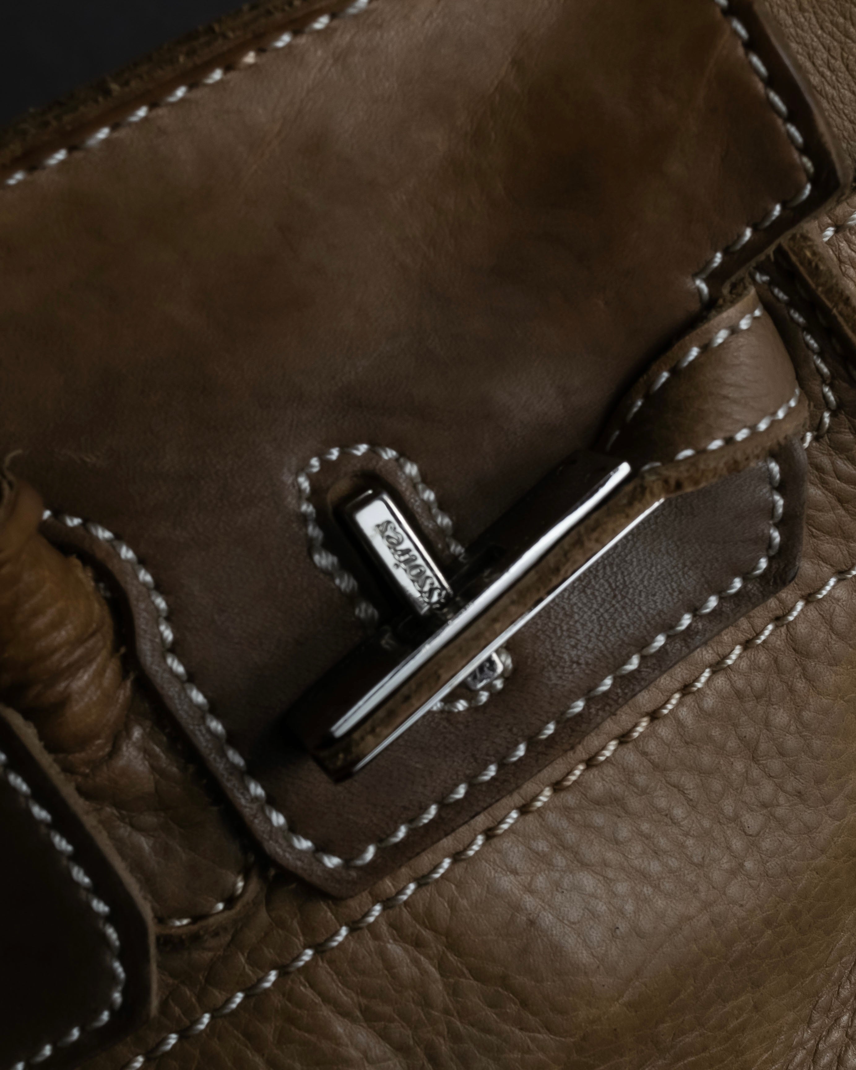 "Mademoiselle Accessories"
 Silver parts design leather one handle bag