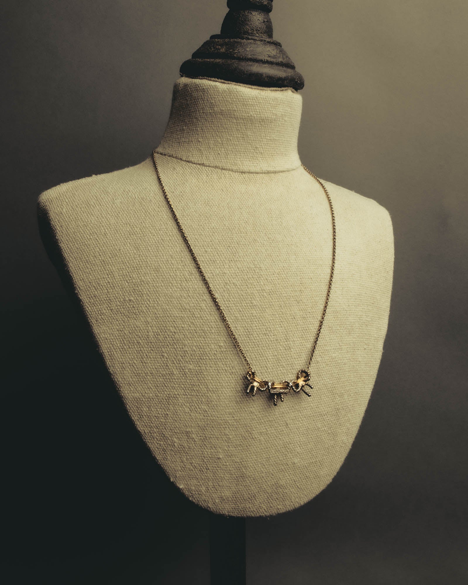 "Tiffany & Co." 80's-90's Sculptural triple bow necklace