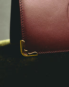 “Cartier” 90’s Must de Cartier burgundy embossed leather bifold wallet