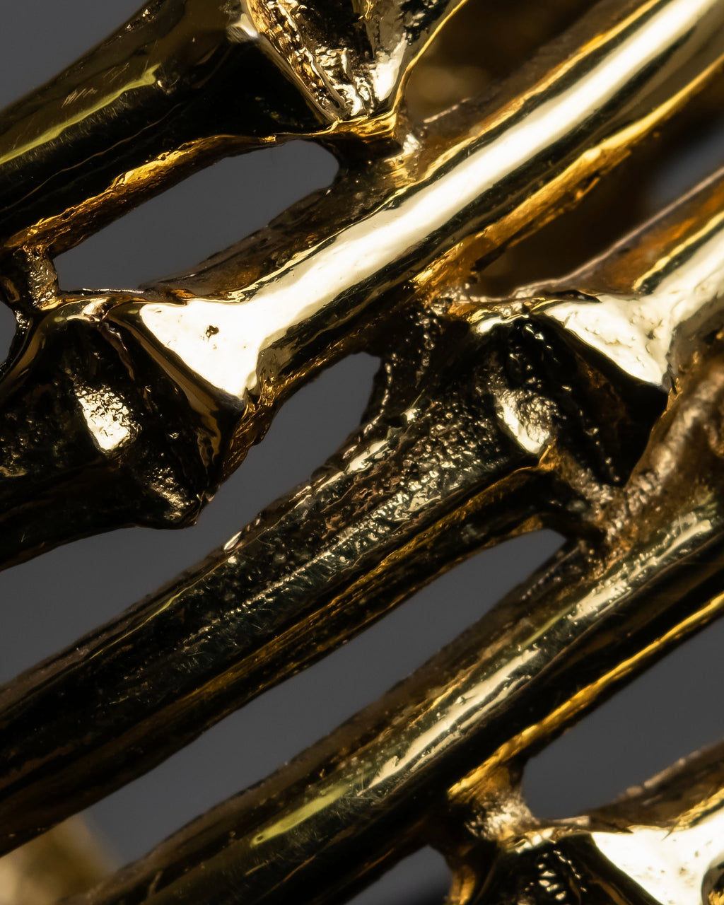 "YVES SAINT LAURENT" Skeletal arm shape design gold bangle