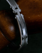 "Dolce & Gabbana" Curved rivet design silver metal bracelet