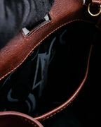 "Salvatore Ferragamo" Half-moon shaped Bordeaux color leather shoulder bag