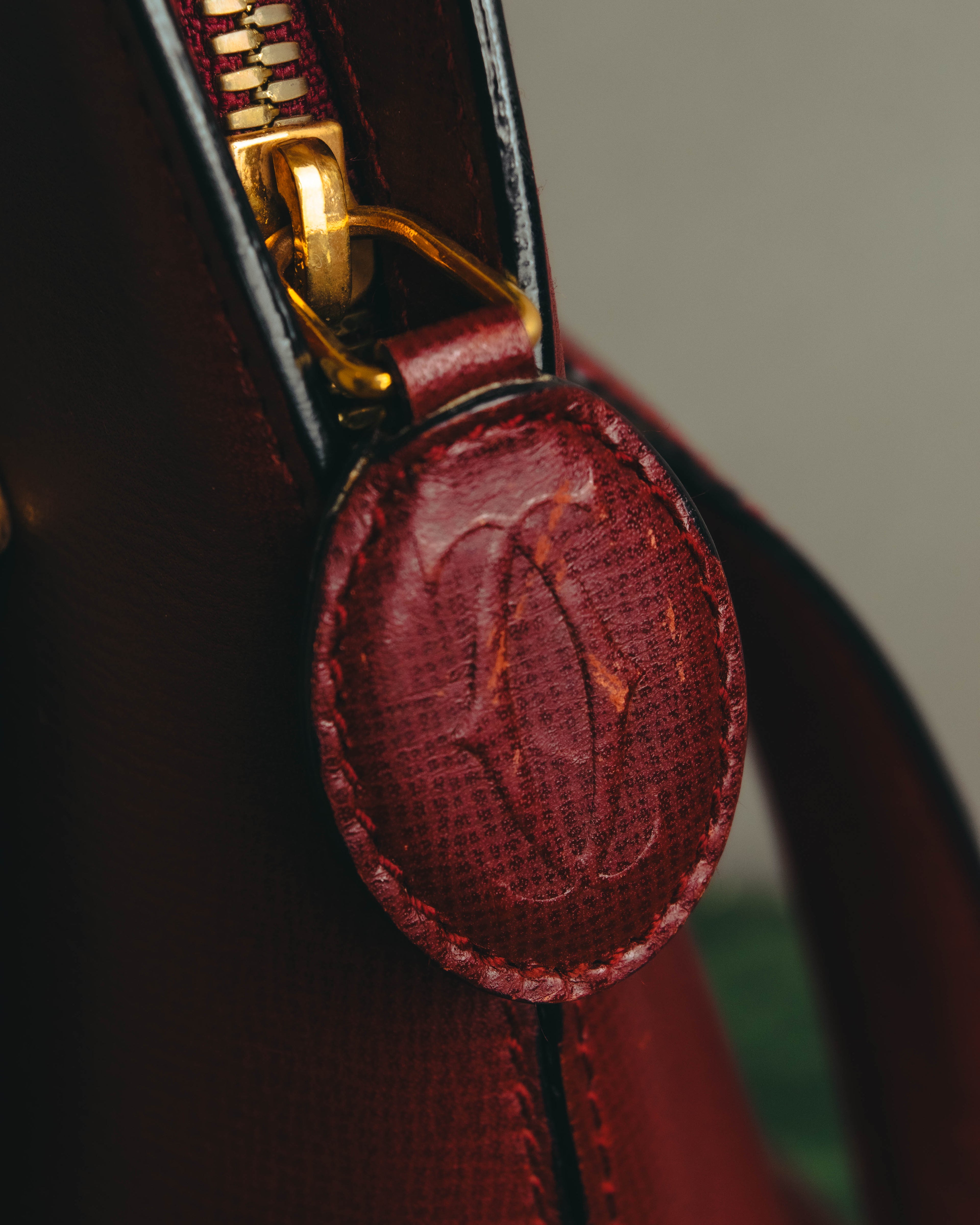 "Cartier" 80's-90's Bordeaux leather handbag