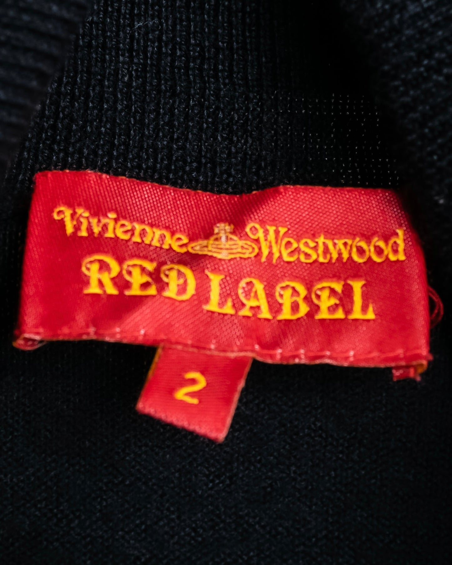 "Vivienne Westwood RED LABEL"
Orb embroidery high neck short length knit