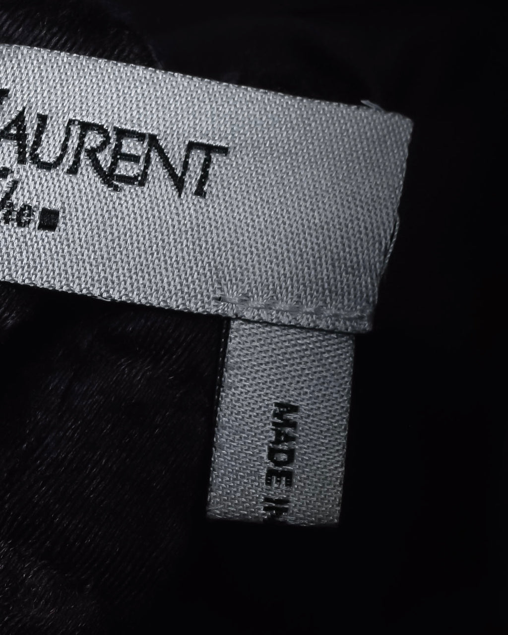 "Yves Saint Laurent Rive Gauche"
Twisted front sleeveless shirt