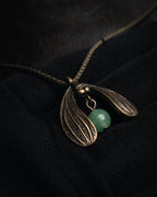 “Christian Dior” 90’s-00’s Antique gold botanical pendant necklace
