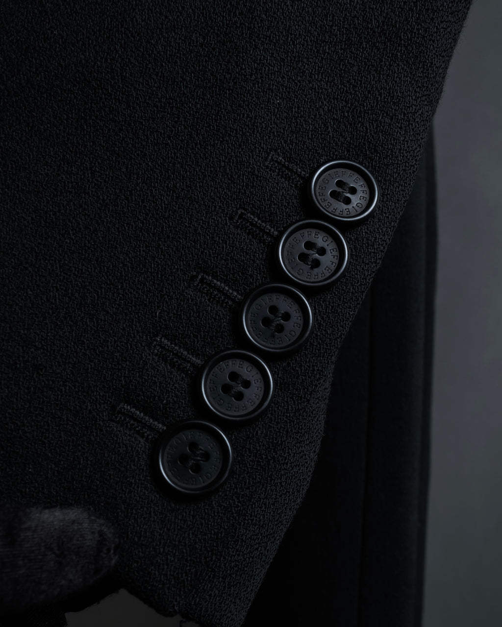 "GIANFRANCO FERRE" Multiple button sequences shaped long coat